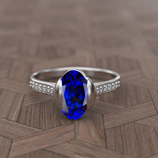 Gold Round Oval Blue Sapphire and Diamond Ring - 02SH01